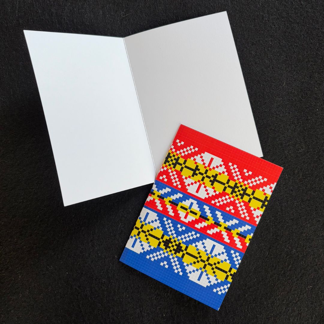 A Single 5 x 7 inch Card with an Envelope, Featuring Traditional Fair Isle Inspired Blue and Red Knitting Designs by Jennifer Daley
